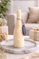 Candela autoportante a forma di bottiglia di champagne – profumo vino & miele