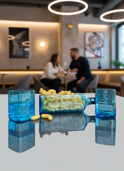 Set aperitivo in vetro realizzato da bottiglie Bombay Gin riciclate con bicchieri e piatto design