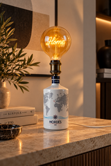 Lampada da bottiglia Nordés con lampadina LED vintage con scritta