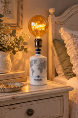 Lampada da bottiglia Nordés con lampadina LED vintage con scritta